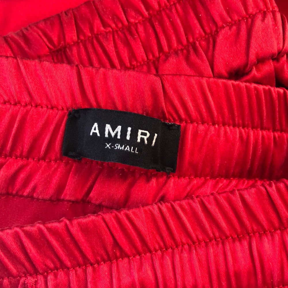 AMIRI red silk jogger pants